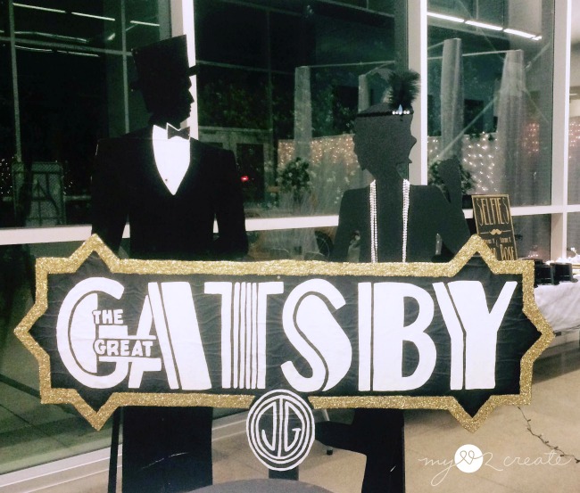 Gatsby sign with tux guy and flapper girl