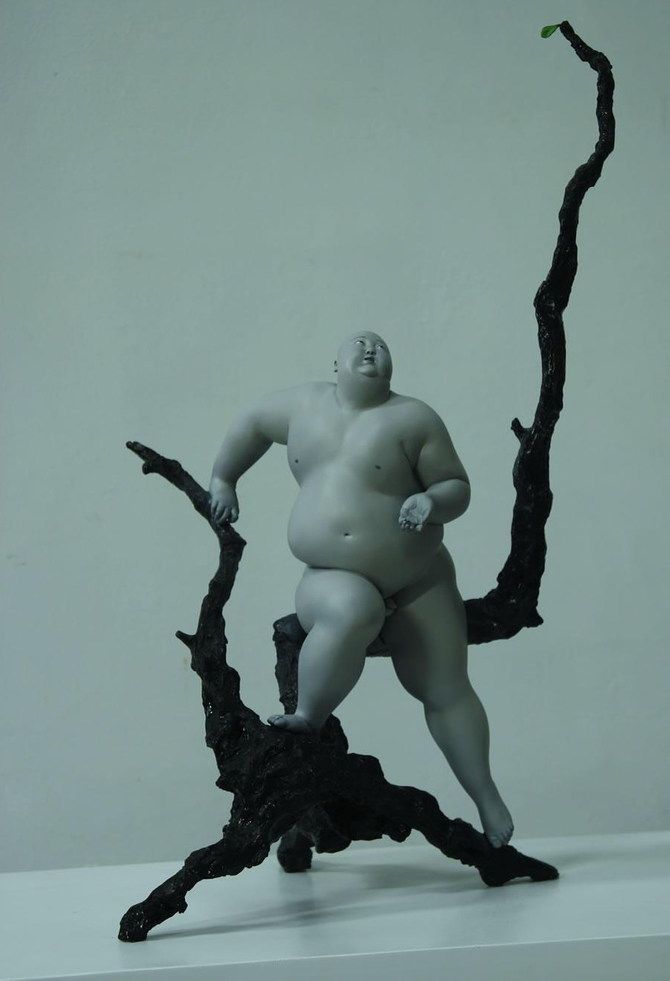 Escultura oriental de gordo