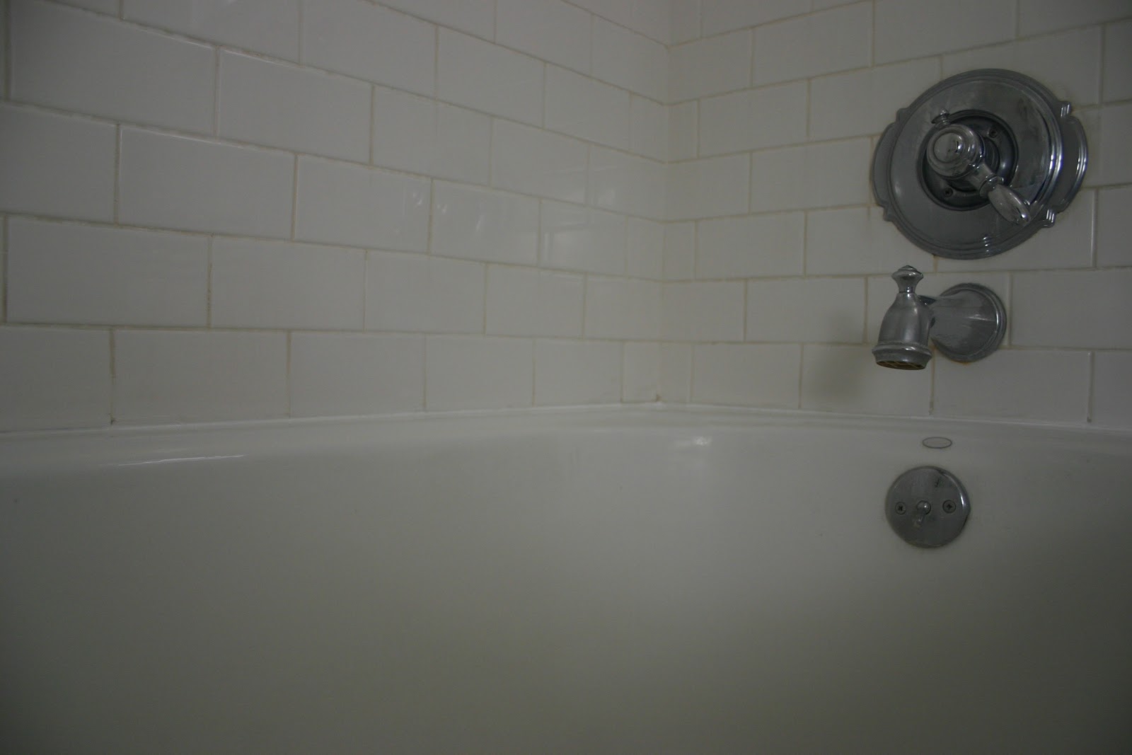 re caulking the bathtub - The Gardener's Cottage