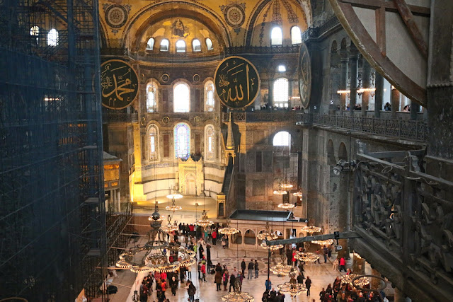Beautiful combination of the interior design of domes, window panels and lighting in Hagia Sophia at Sultanahmet in Istanbul, Turkey Beautiful combination of the interior design of domes, window panels and lighting in Hagia Sophia at Sultanahmet in Istanbul, Turkey