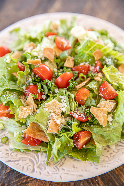 Green Jacket Salad - original recipe from the Green Jacket restaurant in Augusta. SO simple and it tastes great! Lettuce, tomatoes, parsley, green onions, pita chips, olive oil, red wine vinegar, seasoned salt, oregano and parmesan cheese. Goes great with chicken, steak, soup, sandwiches, pizza - anything! Can make in advance and toss together when ready to serve. #salad #masters #vegetables #recipe #sidedish Green Jacket Salad - original recipe from the Green Jacket restaurant in Augusta. SO simple and it tastes great! Lettuce, tomatoes, parsley, green onions, pita chips, olive oil, red wine vinegar, seasoned salt, oregano and parmesan cheese. Goes great with chicken, steak, soup, sandwiches, pizza - anything! Can make in advance and toss together when ready to serve. #salad #masters #vegetables #recipe #sidedish
