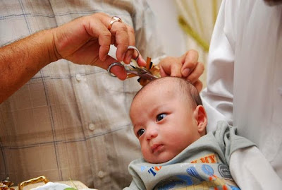 Bayi sedang dicukur rambut pada prosesi Akikah pengertian akikah dan kurban, pengertian akikah dan dalilnya, pengertian aqiqah menurut bahasa dan istilah, pengertian aqiqah menurut istilah, pengertian akikah dan hukumnya, hukum akikah anak lelaki, hukum akikah anak perempuan dalam islam, hukum akikah anak lelaki seekor kambing, hukum akikah anak yang sudah meninggal, hukum akikah anak luar nikah, hukum akikah anak, hukum akikah adalah, hukum akikah anak perempuan, pengertian aqiqah beserta dalilnya