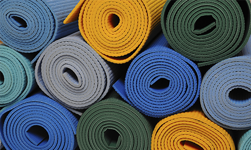 A stack of the best yoga mats.