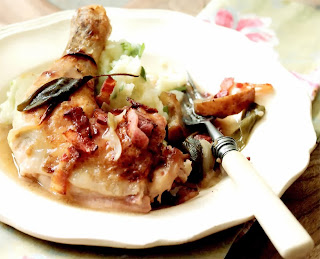 Chicken and Apple Casserole: Chicken pieces stewed with apples and bacon in a chicken stock and cider base served with mashed potatoes and cabbage