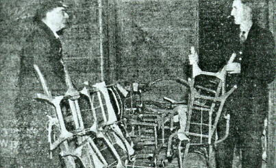 Percy Blank and Reginald Miller unloading wagon at Gosport 1957