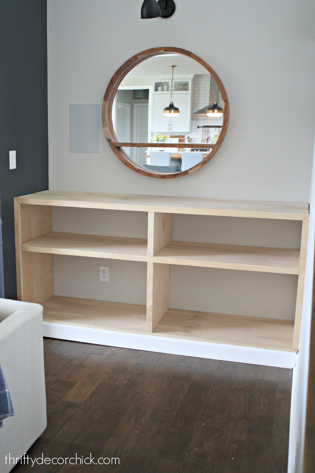 Built in bookcase by fireplace