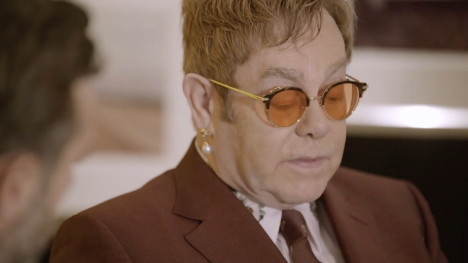 Harvey Benge Elton John and David Furnish talk with Christie's Head of