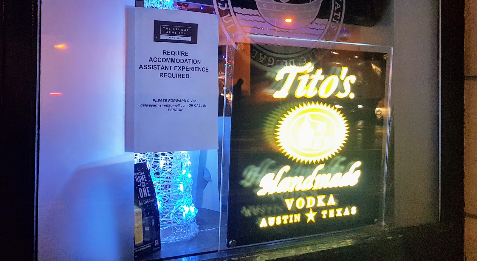Accommodation assistant and illuminated sign for tito's handmade vodka