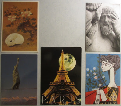5 postcards: cat, Paris, Picasso, etc.