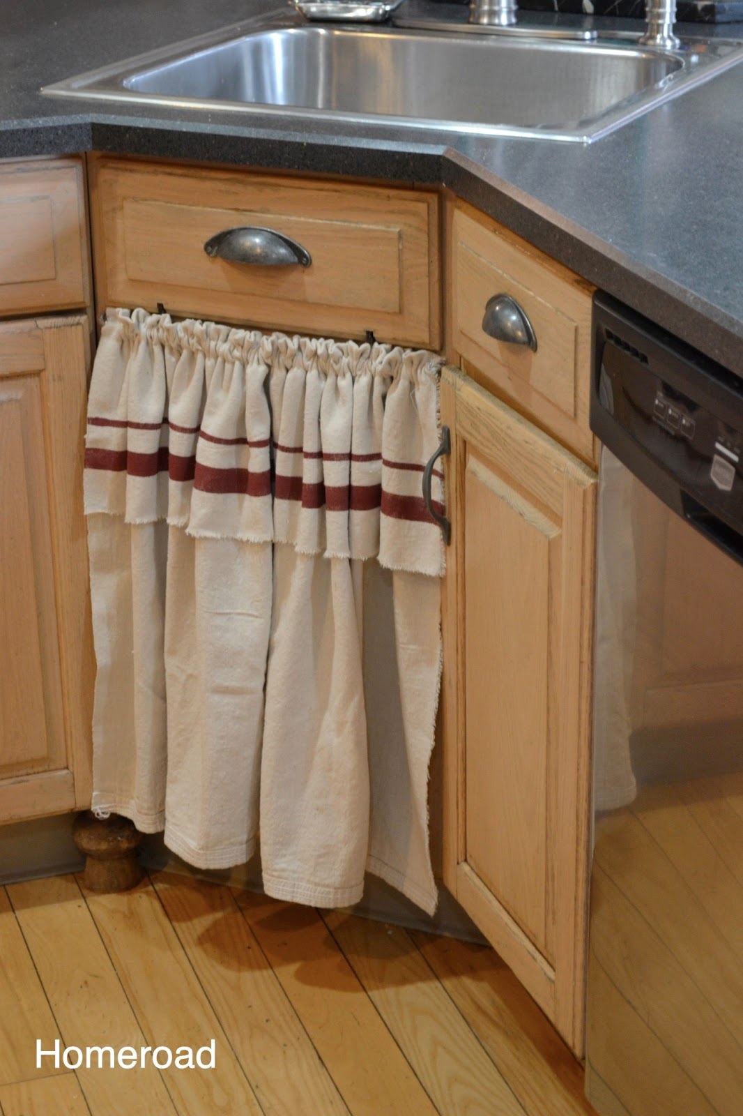 A Farmhouse Kitchen and Skirted Sink