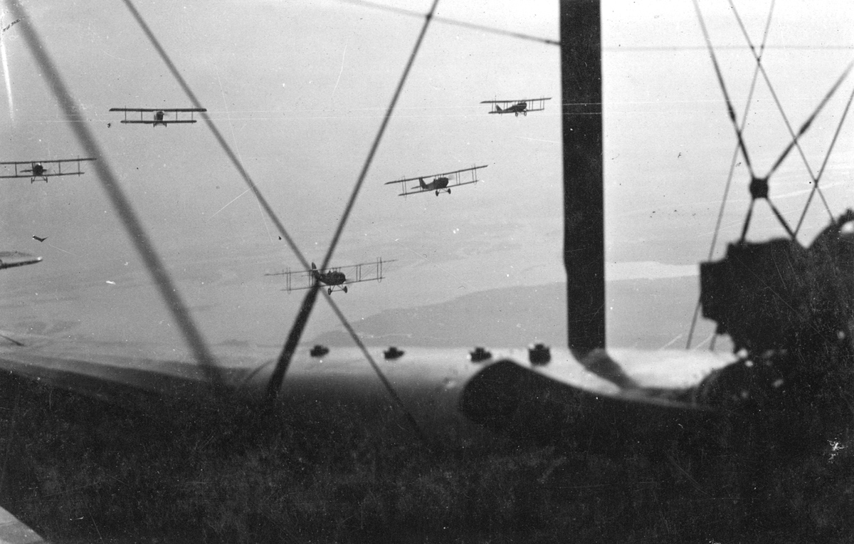 A squadron of U.S. Curtis aircraft in flight, circa 1917.