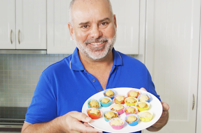 Dr Mark Perissinotto Head Veterinarian at VetShopAustralia presents a plate of pupcakes