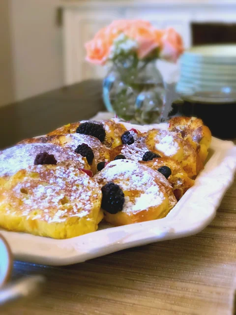 Challah French Toast Recipe, fluffy thick sliced Challah bread dipped in a creamy egg mixture until soaked through but not soggy then fried in sizzling butter.  Ideal to serve for brunch, weekend family breakfast, or like we do for weeknight dinner.