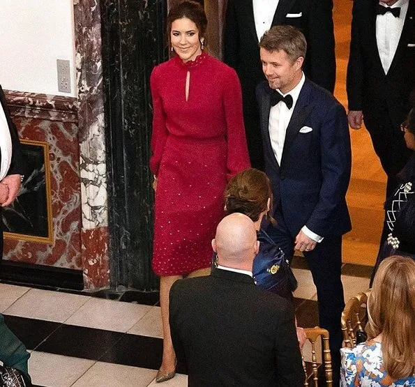 Crown Prince Frederik and Crown Princess Mary, hosted a concert a dinner in the Dome Hall. red skirt and blouse