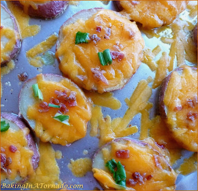 Loaded Red Potato Slices, red potatoes roasted and loaded with ingredients similar to potato skins | Recipe developed by www.BakingInATornado.com | #recipe #potato
