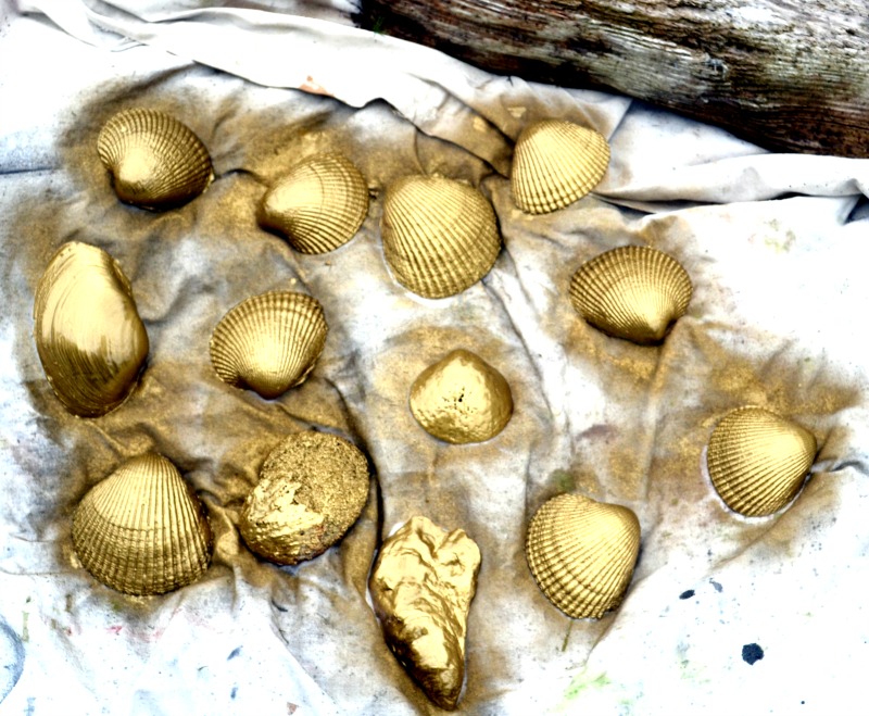 Gold painted seashell candles