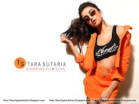 student of the year 2 actress name, tara sutaria hot photo in orange dress and black bra, black sun glasses
