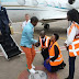 Photos: Airport staff kneel down to welcome wealthy Malawi pastor, Prophet Bushiri as he arrives Uganda in his private jet