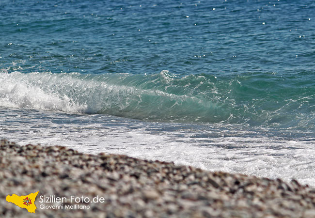 Welle am Strand von San Marco