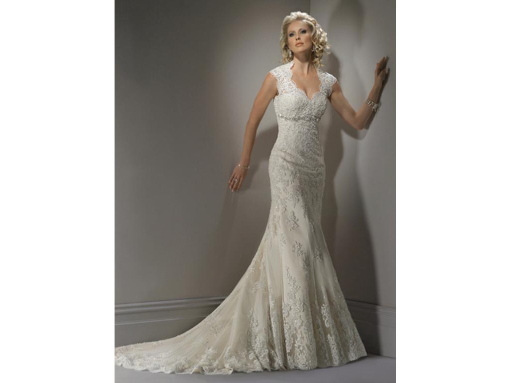 lace wedding dress with keyhole back Featured Gown: Maggie Sottero Bernadette