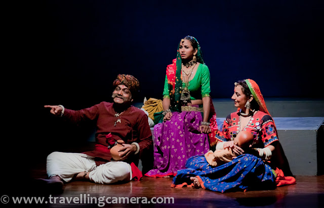 Recently Ranjit Kapoor directed three new plays with NSD Repertory - 'Chekhov ki Duniya', 'Aadamzad' and 'Punchlight' !!! Sunil Upadhyay being one of the main characters in these plays. Let's have a qucik PHOTO JOURNEY of Aadamzad play, which was showcased at Sammukh, NSD, Mandi House, Delhi !!While one troop of NSD Repertory company is busy in Banglore and other cities, Ranjit Kapoor picked other folks to work on three new plays. Other folks are showing Summer Theatre plays in other cities. Sunil was one of the main characters in those plays but he stayed back for these new set of plays and did a great job !!!Aadamzad starts with a song by whole cast of this wonderful play by Ranjit Kapoor. This time I was not very comfortable in clicking photographs inside this auditorium. During Summer Festival, NSD used to announce that 'don't use flash during play', but this time there was no such announcement, so I was not comfortable. Although I  had taken permissions. At times, people start clicking photographs with Mobiles and by default flash is ON for low light conditions. This becomes really weird while play is running and someone use flash. Most of the times, I take few seconds to lift us the camera and click a shot with appropriate gap between two consecutive shots. It's really important to make sure that we don't distract audience and actors in that auditorium !!!Aadamzad is a story about people with bad intentions for their selfish reasons. It started with a couple who were trying to have baby and had tried various tantras to have a baby. It's difficult for me to explain the extent to which they did wrong things to have one. The man standing above is talking to her 5th wife and you need to watch the play for knowing the story of other 4 wives...Then a girl came to their place and started telling her story.. Here she is getting married to a businessman. Just after marriage her husband went back to his business-city. She got pregnant and then left her 15 days baby at home... Again to know more about the reason, 'why'... you need to see Aadamzad !!!These folks sing wonderful songs during the play !!! There are various songs during the play and all of them are actually sung by actors of this play. Anirudh was lead singer here and he sung them really well !!!Prasanna Soni, who was playing the role of brother-in-law of lady who left her home. He was regularly describing whole situation to his elder brother although in a different form. Without disclosing more about him, I will simply close the caption of this photograph here.After some efforts by this person, baby was rescued from the other village, but story took a turn here. This couple was unimaginably cruel and did some acts which can't be described here. Watching this play becomes must to know about this human nature for selfish reasons...Let me shut up and not disclose the story here !!! Few things are obvious in these photographs but, play was not that obvious... So keep guessing and wait for next act of Aadamzad !!!Expressions can be wrong and overall environment can be misleading... Aadamzad also talk about this fact that how cheap things human-beings can do when it comes to their personal benefits.Weapons are used in this play very well... Overall actions were flawless and close to real stuff !!That baby became a 'Daku' later ... Sunil Upadhyay played the role of this 'Daku'.. But why he is standing with this couple who are not his parents. Does he know about his past and what he wants to do in future ?Rajini, who never got pregnant and kept trying different tona-totkas ... But unhappy most of the times... She was fifth wife of Kailash (original name of this character)Cast of Aadamzad :: Deep Lumar == Jawed == ?? == Madhumita == Anirudh Wankar == Rajini == Kailash Chauhan== Prasanna Soni == Sunil UpadhyayAnirudh Wankar was main dictator of this story and he was really amazing. He described various acts brilliantly and sung each song with full enthusiasm.A Photograph of Ranjit Kapoor who directed this play. After 4 shows at Sammukh, NSD.. this cast will showcase Aadamzad in 13 different cities of Madhya Pradesh !!! All the best Guys !!!