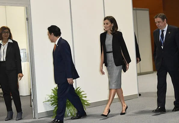 Queen Letizia wore Hugo Boss Dechesta glen check stretch cut cap sleeve sheath dress, and Zara cape style jacket