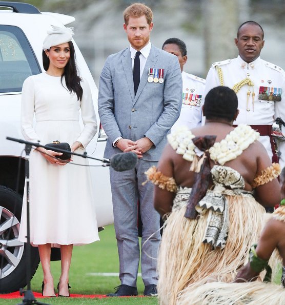 Meghan Markle wore ZIMMERMANN long sleeve dress and Duchess wore Safiyaa London Ginkgo Cape Dress