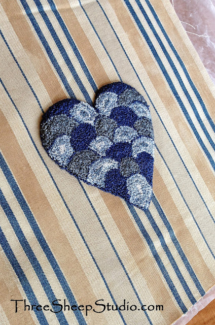 'Most Loved' Punch Needle Heart on Mattress Ticking by Rose Clay 'Most Loved' Punch Needle Heart on Mattress Ticking by Rose Clay