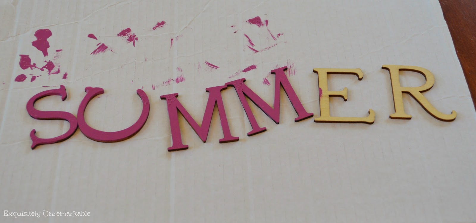 Summer spelled out in wooden letters