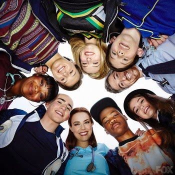 Characters from Red Band Society posed in a circle, looking down.