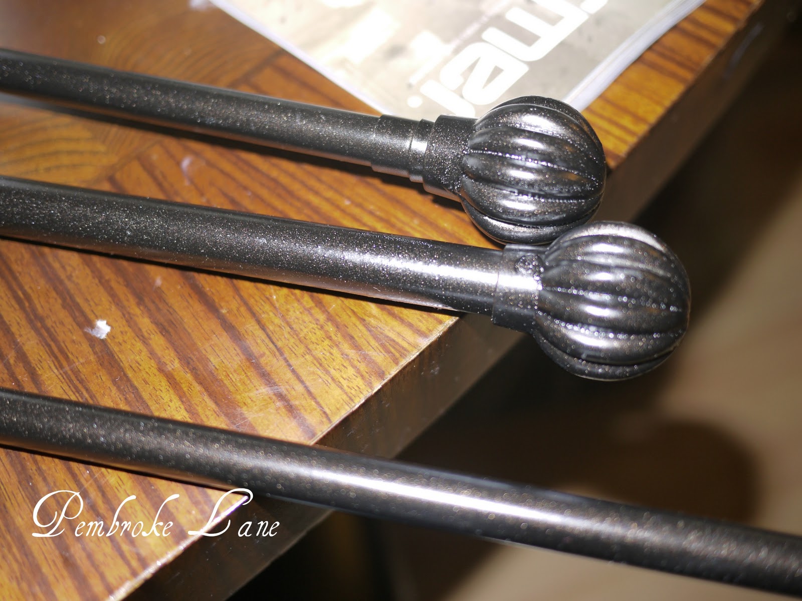 Pembroke Lane Spraypainting Curtain Rods and DIY Tablecloth into Curtains