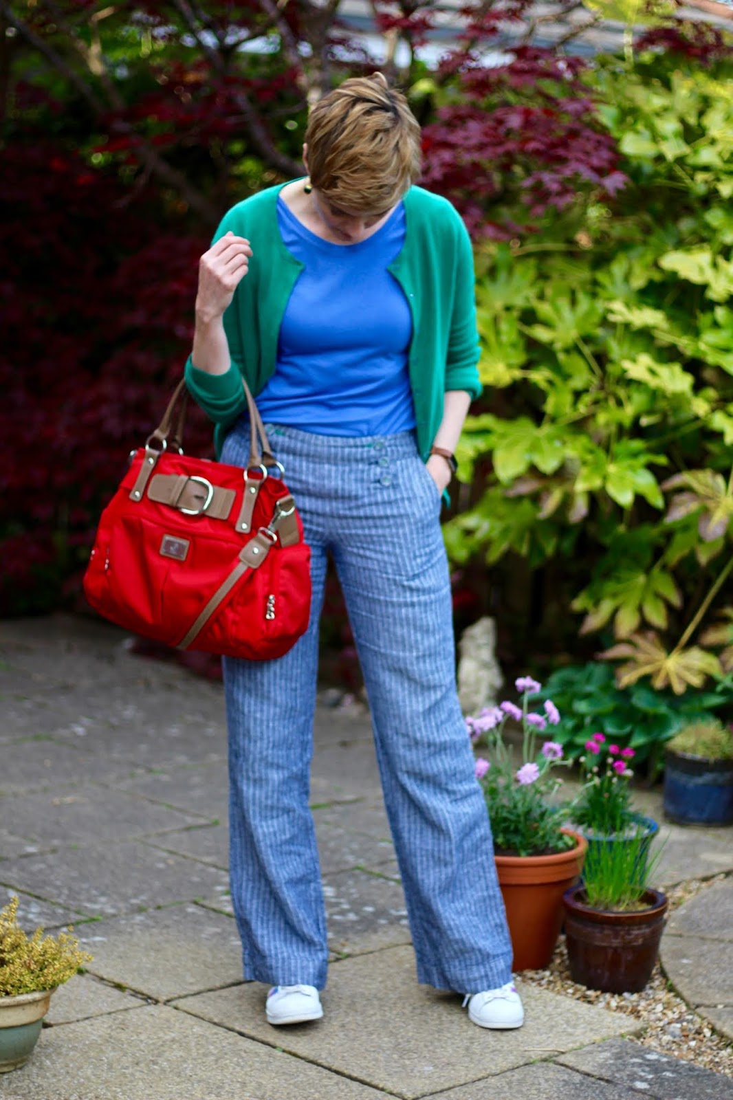 Blue sailor trousers, green boden cardigan, red bag & Superstars | Fake Fabulous