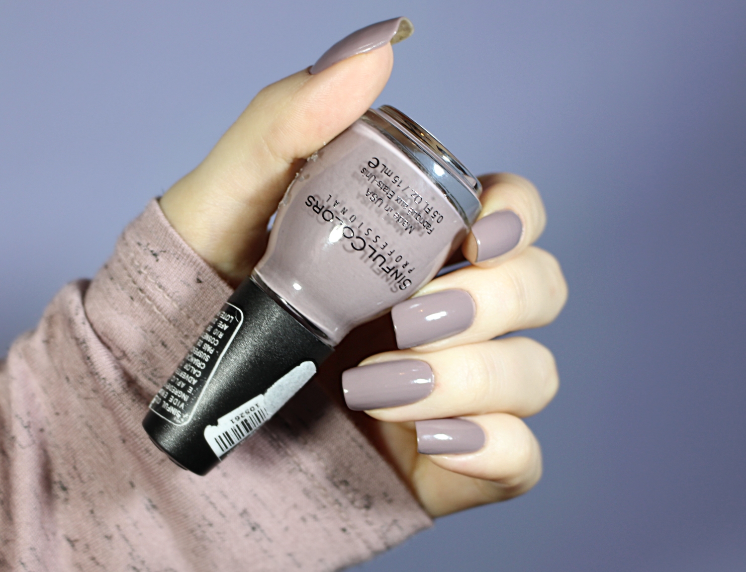 close-up of a cool grunge nail look with taupe is dope nail polish by sinful colors