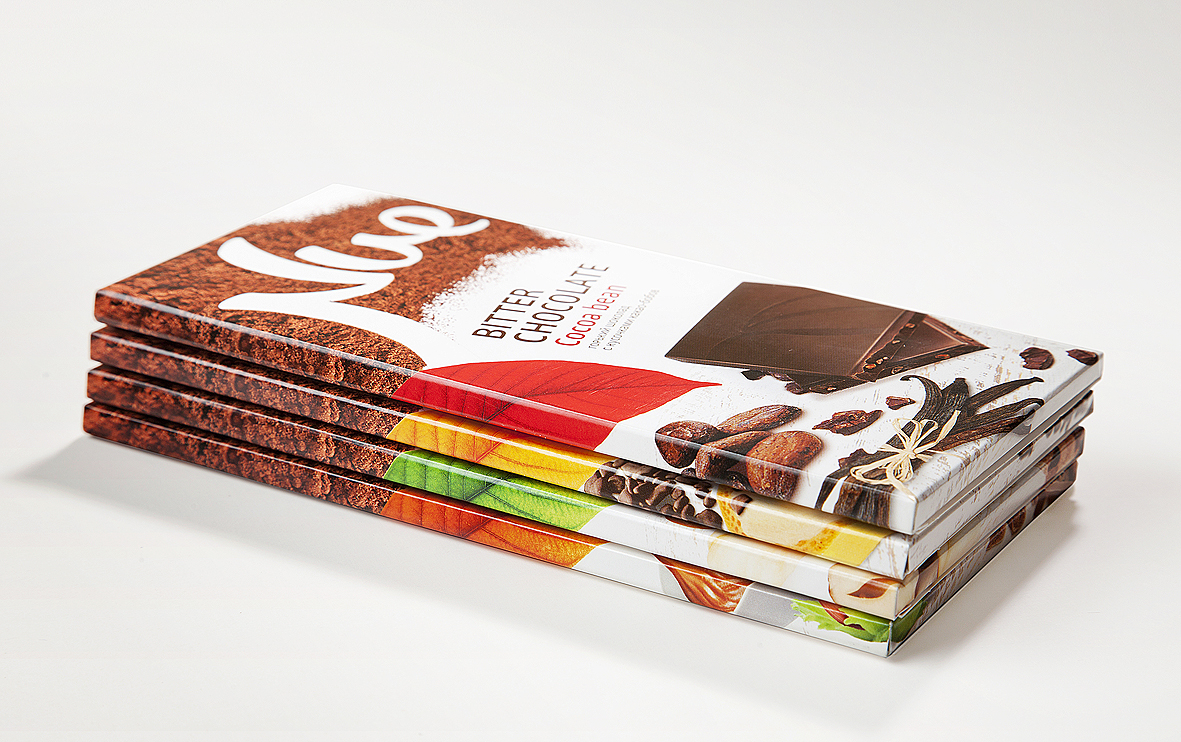 Пачка шоколадок. Шоколадки в упаковке. Шоколад в упаковке. Упаковка для шоколадной плитки. Шоколадные плитки в пачках.
