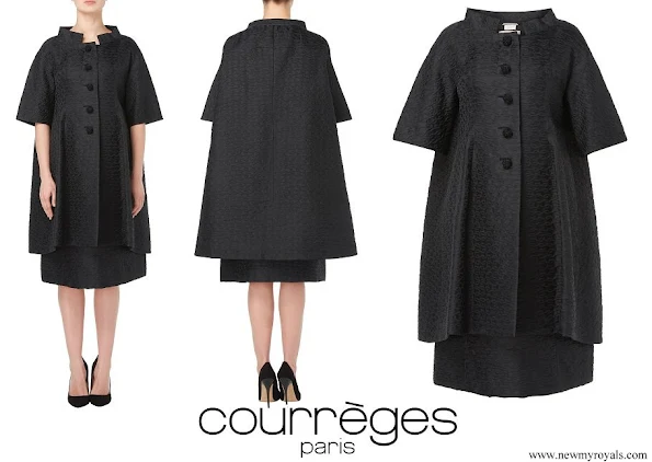 Meghan Markle wore Courreges Paris Haute Couture black trapeze coat
