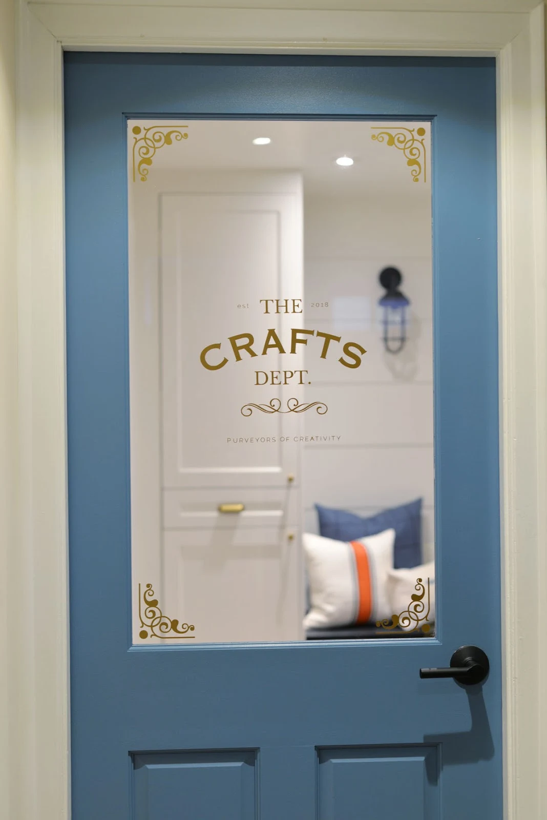 craft room door | behr blue moon bay | door decal