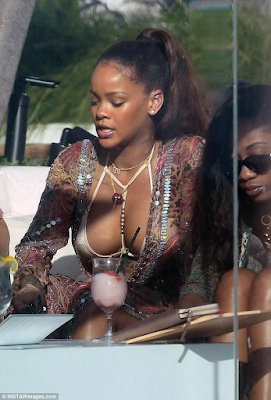 2aa Rihanna flaunts her ample cleavage in skimpy bikini as she holidays in Miami