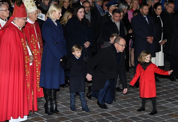Prince Albert, Princess Charlene, Princess Gabriella and Prince Jacques attended Saint Devota event. royal blue cahmere wool coat