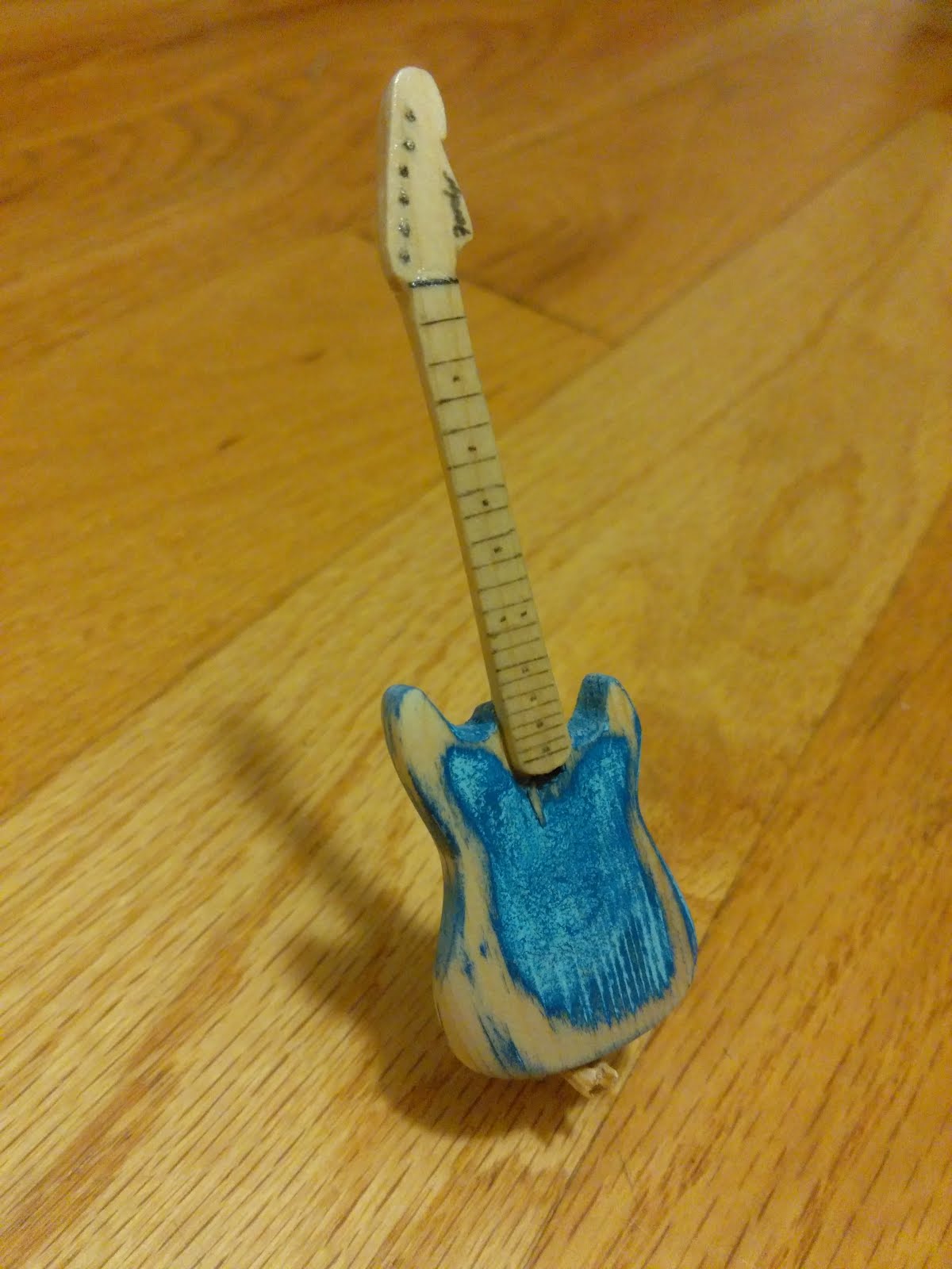 [Mattwins] Building a tiny guitar, because, you know, it's a tiny guitar.