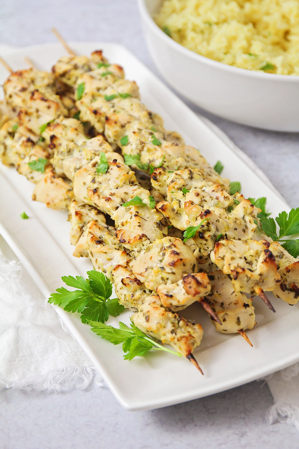 These savory and flavorful greek chicken skewers are an easy and delicious weeknight meal!