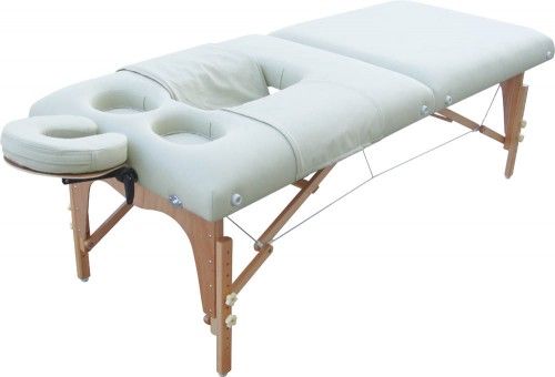 Pregnancy massage table. We have a cute out table like this available at elements!! Cut out for your comfort, no more being massaged on your side :) 