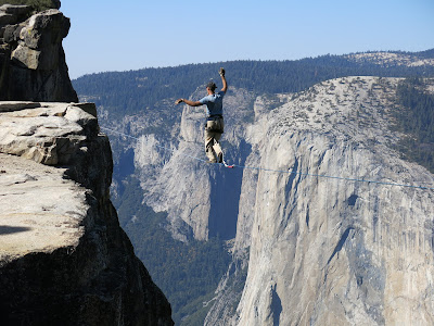 source https://upload.wikimedia.org/wikipedia/commons/e/e0/Man_highlining_in_Yosemite_National_Park_with_El_Capitan_in_the_background.JPG