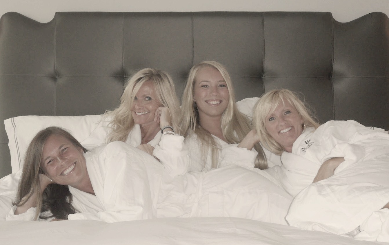 Four blondes in white spa robes Waldorf Chicago by Hello Lovely Studio