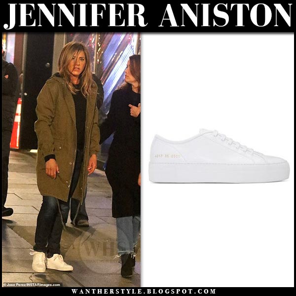 Jennifer Aniston in white sneakers and khaki parka in NYC on May 9 I