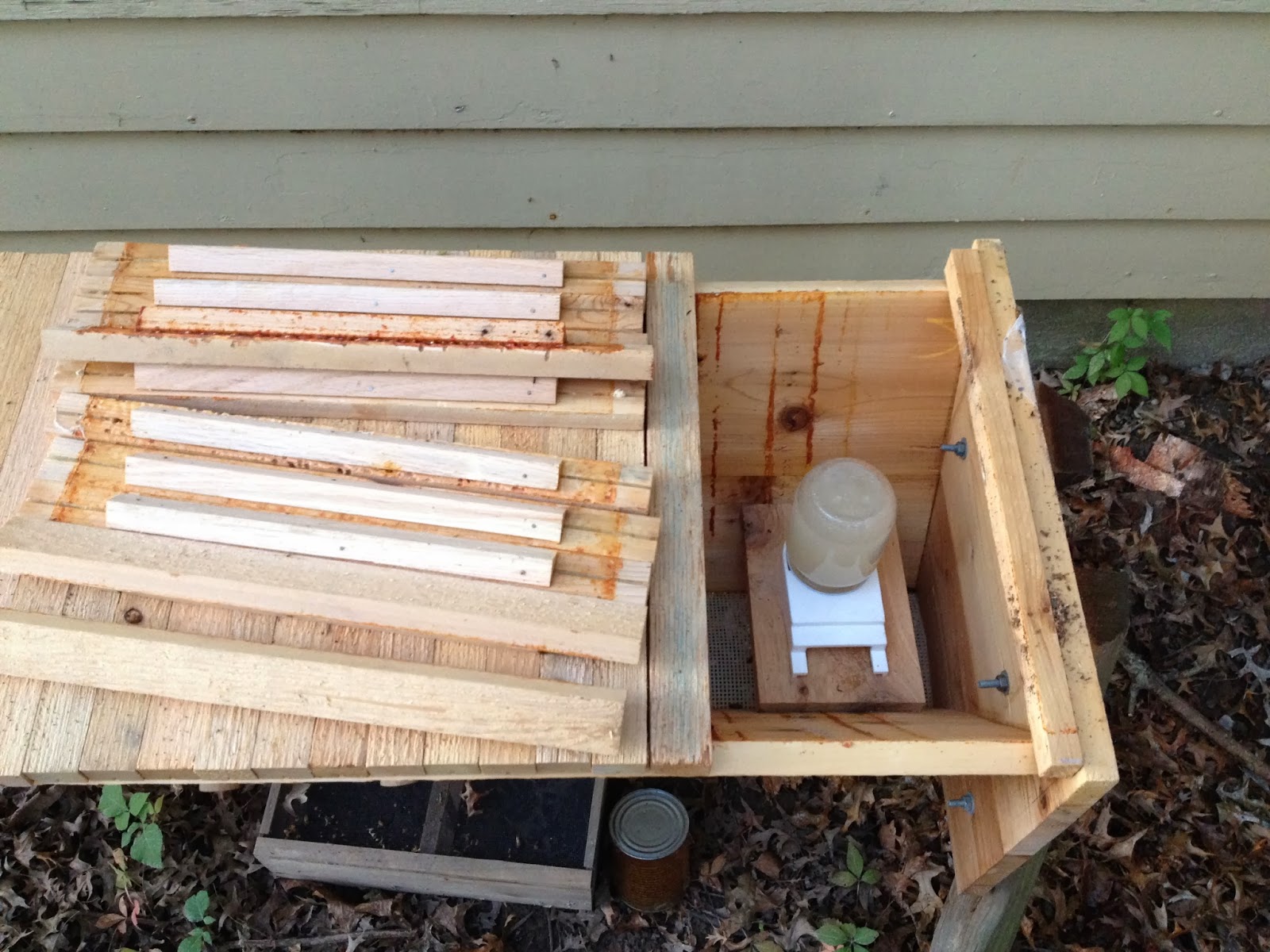 little country house Feeding Bees In A TopBar Hive