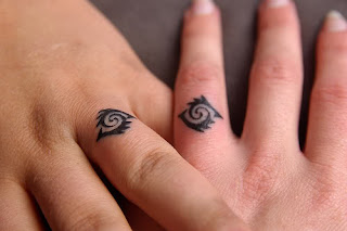 finger tattoos, tattooing
