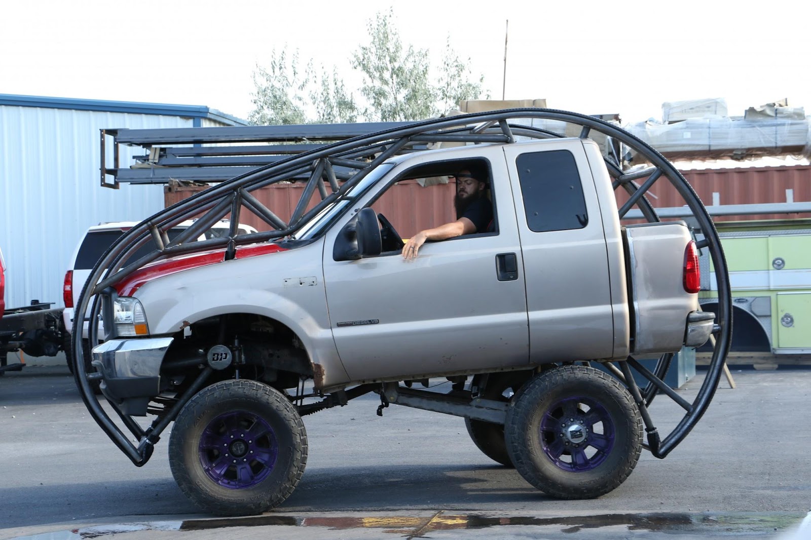 Watch a heavilymodified heavy duty pickup truck somersault and defy
