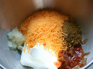 Perfect Fall Cheese Ball - Cream cheese, shredded cheese, salsa, onions, and seasoning in a mixing bowl