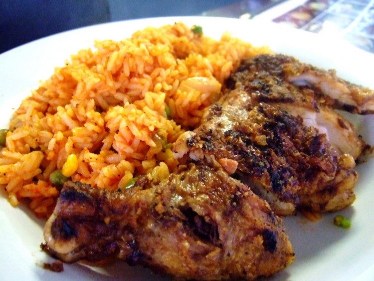 Yummy Nigerian Jollof Rice with Fried Fish Nigerian Foods And Recipes