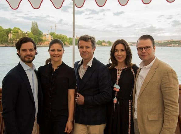 Crown Prince Frederik, Crown Princess Mary, Crown Princess Victoria Prince Daniel and Prince Carl Philip on the Dannebrog Royal Yacht in Stockholm